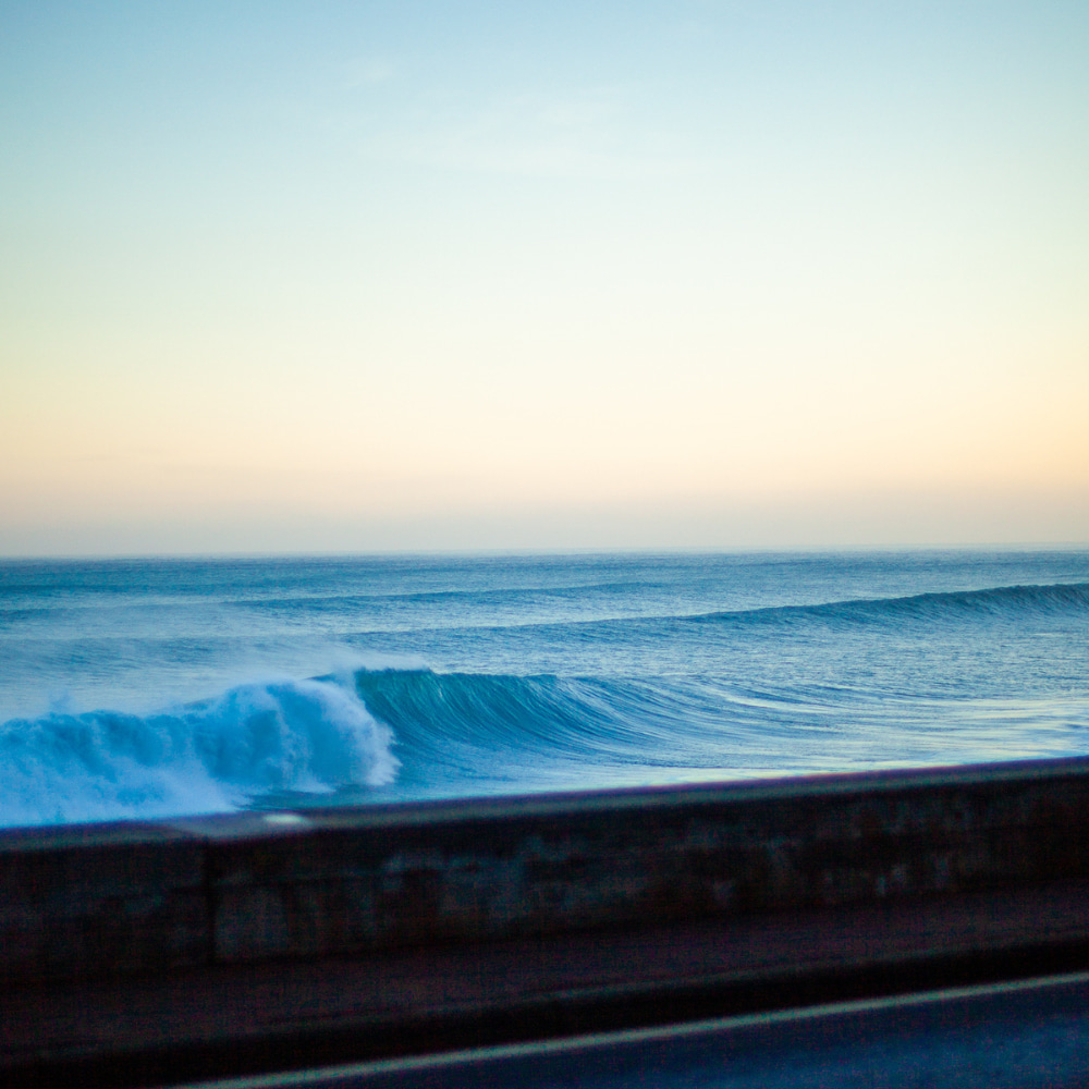 Landscape of beautiful blue waves perfect for a surf guiding session